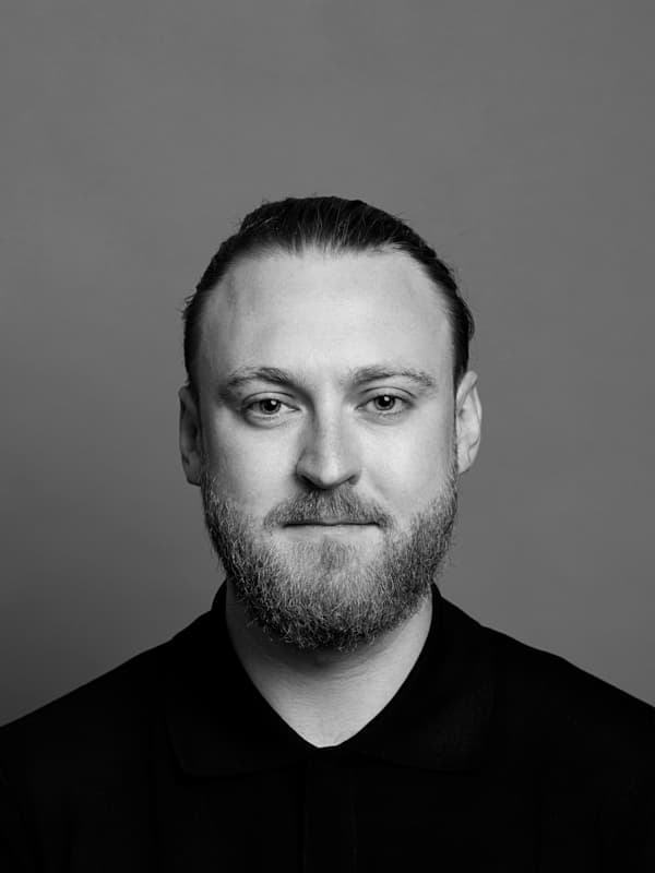 Black-and-white headshot of Rasmus Thunborg